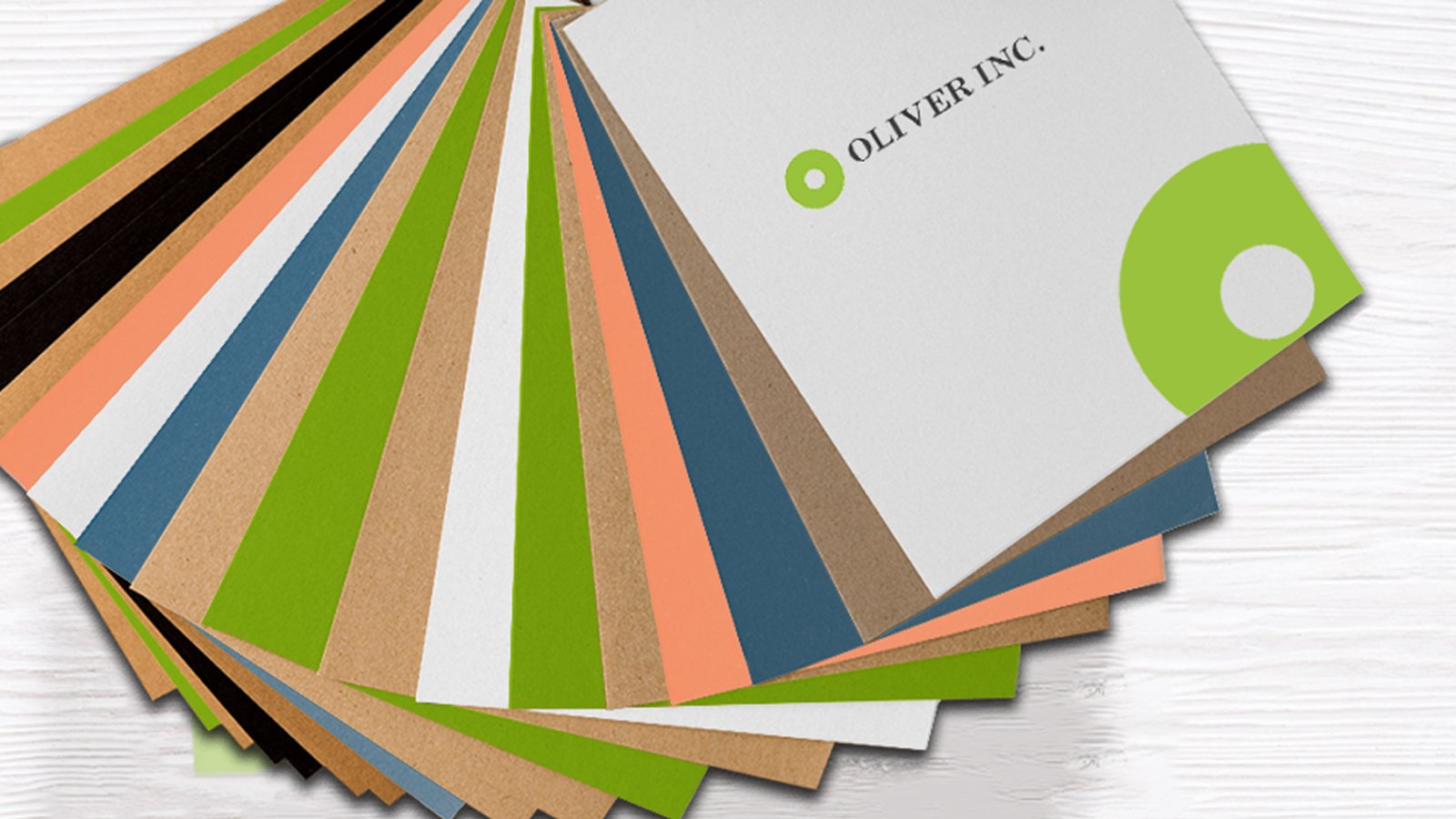 Oliver Paperboard Card Option for Packaging - Wide array of card colors with top card having Oliver logo
