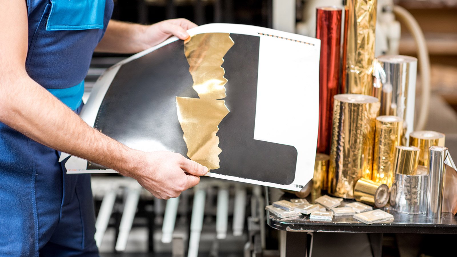 employee prepping foil wrap