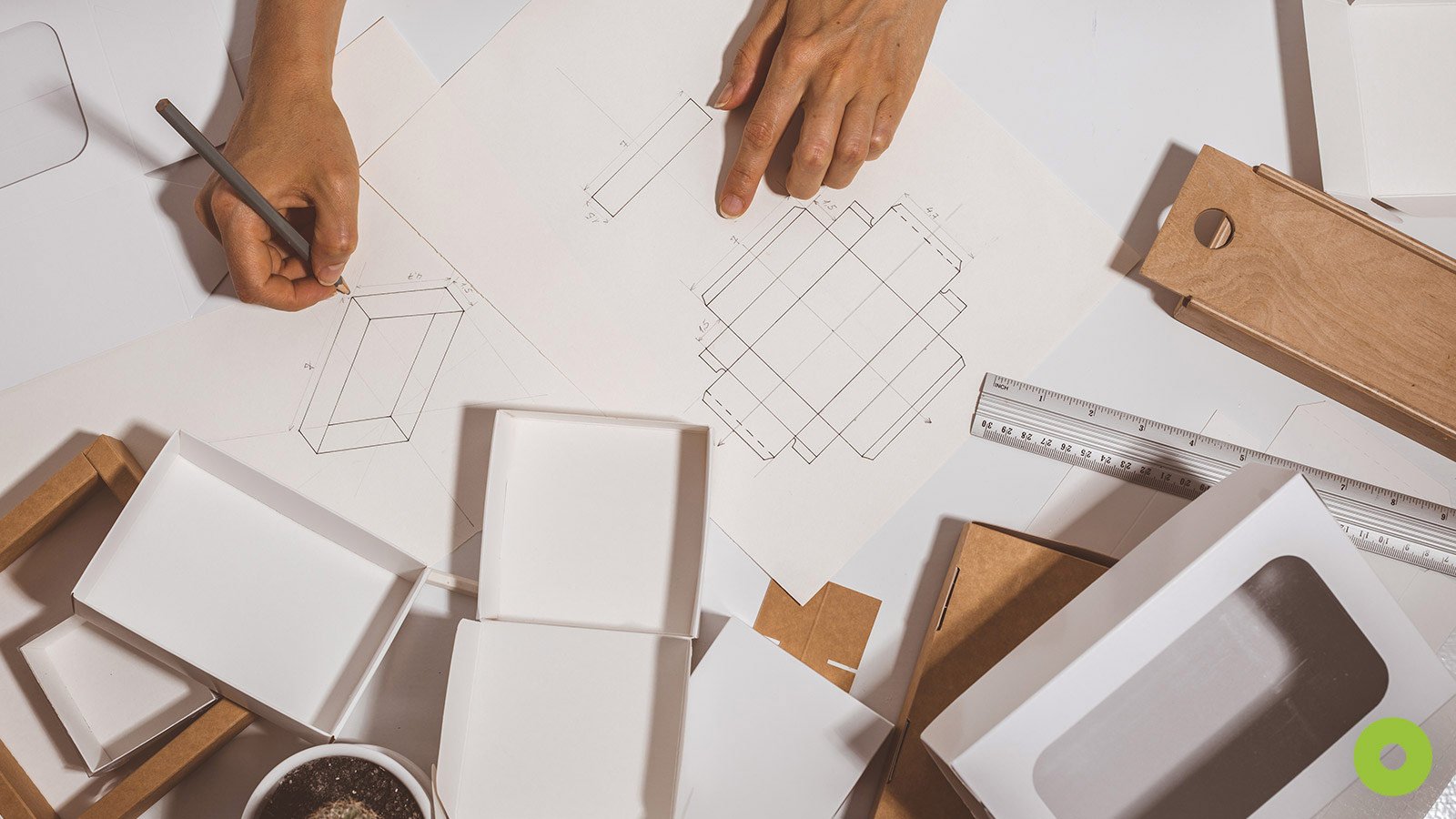 product designer sketching folding carton designs